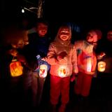City Garden School Photo #9 - Shining a light on community togetherness! We celebrate our lantern walk with students proudly showing off their handmade lanterns.