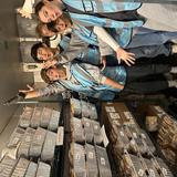 Mullen High School Photo #2 - Student working in the food bank as part of service week.