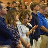 Mullen High School Photo #4 - Students and their families celebrating Grandparents Day Mass together