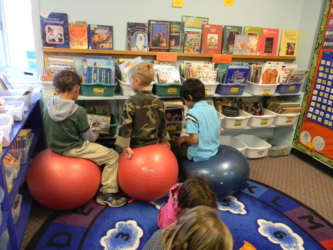 The Mcclelland School Photo #1 - The McClelland School has active seating in Kindergarten-2nd grade. We have stability disk in chairs at the student's desks and stability balls in the reading areas. This helps to stimulate blood flow, encourage active learning and develop core muscles.
