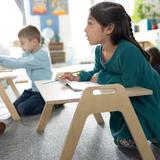 Fraser Woods Montessori School Photo #3 - In a Montessori classroom, students choose where and how they work. This freedom of movement supports focus, independence, and a natural love of learning - hallmarks of the Fraser Woods experience.