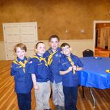 Assumption Catholic School Photo #10 - Assumption Catholic School has a very active Cub Scout program. Here are four of our Cub Scouts who have just received their Bear Badge during the Blue and Gold Dinner.