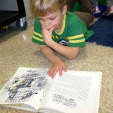 Trinity Christian Preschool Photo #5 - Enjoying a good book.