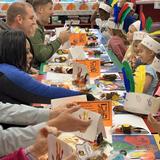 Holy Cross School Photo #8 - Pre-K Students gathering with their families during a Thanksgiving Feast!