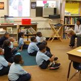 Cornerstone Schools-washington Photo #1 - Second grade teacher Ms. Wright and her students enjoy some read-aloud time.