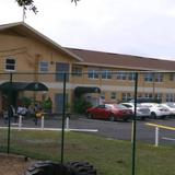 Azalea Park Baptist School Photo #4 - The school stands on 9 acres of land with two connecting buildings. Each has two levels and a total of over 20 classrooms. All classrooms are equipped with smart boards.