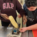 Sophia Academy Photo #9 - Making homemade spaghetti in culinary class