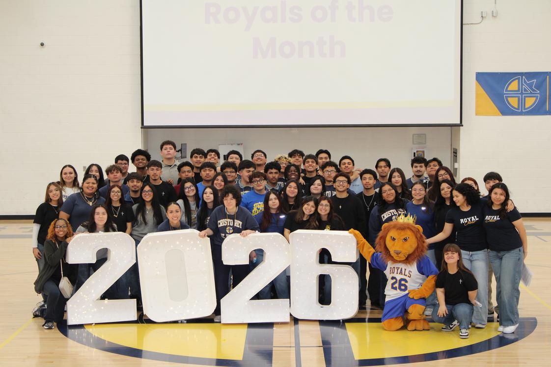 Cristo Rey St. Viator College Preparatory Photo #8 - Our mascot, Roy the lion, with the class of 2026