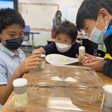 Frontiers Academy Photo #3 - Students hands-on inquiry of their science unit.