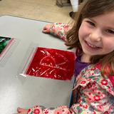 International Children's Academy Photo #2 - Sensory bags are so much fun! This tactile center helps us learn our letters! We love International Children's Academy!!