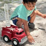 Premier Academy of Temple Terrace Photo #3 - Dig, construct and build in nature! Truck play taps into many areas of play and learning: constructive, sensory, imaginary role play, science, physics and vocabulary.