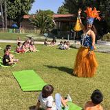 Village Preschool Academy Photo #15 - Hula Show fun during our Summer Program! Village Preschool Academy offers an expansive Summer program with a variety of activities from hands on science, cooking activities, educational assemblies, performers, and of course water play too!