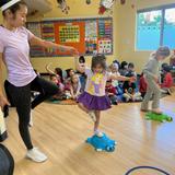 Village Preschool Academy Photo #6 - Children shine as they participate in our free dance program-just one of the many enrichment opportunities we offer, including Tae Kwon Do, music, soccer, and yoga. All programs take place within the comfort and safety of our center, under the caring supervision of familiar teachers and the expert guidance of highly skilled instructors.
