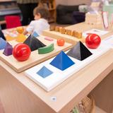 Hand In Hand Christian Montessori Photo #10 - Students learn to identify parts of speech using Montessori grammar symbols.