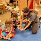 Millhopper Montessori School Photo #6 - Preschool students get up close and personal with a tarantula!
