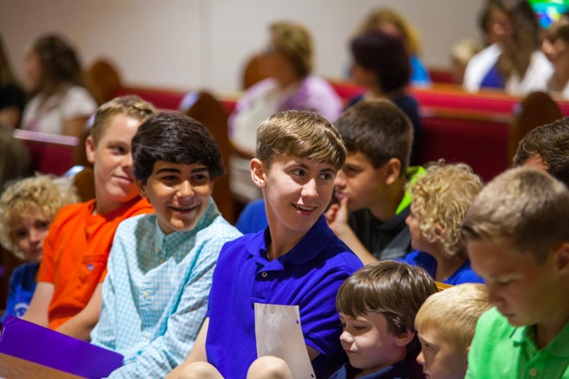 Redeemer Lutheran School Photo #1 - Redeemer has a buddy program that pairs our VPK, K-5 and 1st grade students with our Middle school students. Buddies sit together in our weekly chapel service. From the youngest to the oldest they love building lasting friendships.