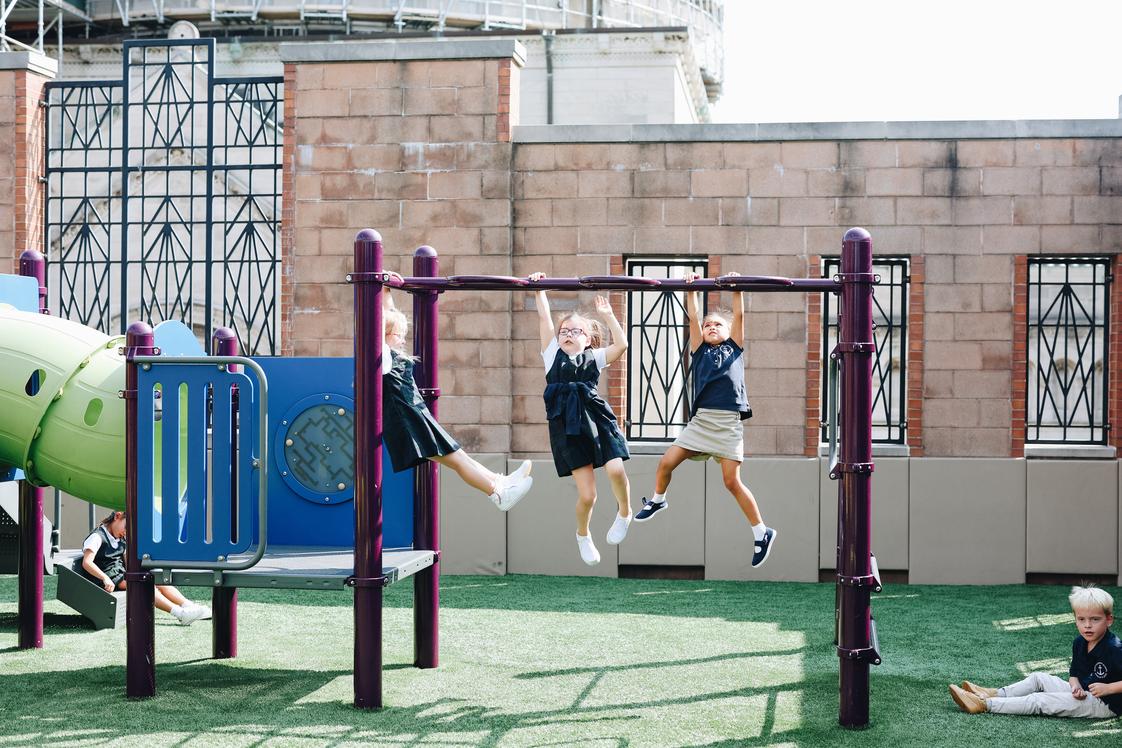 St. Clement School Photo - Saint Clement students having a great time on their rooftop playground!