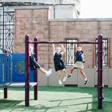 St. Clement School Photo - Saint Clement students having a great time on their rooftop playground!