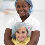 One School Of The Arts and Sciences Photo #9 - Scholars giving back by assembling meals for hungry kids at Feeding Children Everywhere.