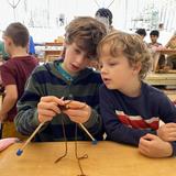 The Waldorf School Of Atlanta Photo #12 - Older students teach younger students to knit