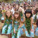 Island School Photo #2 - May Day is Lei Day in Hawai'i. Island School celebrates with an all-school event, followed by a lu'au lunch. These first graders will perform a hula with their class. The entire student body is involved in this special day.