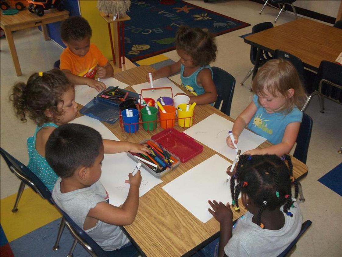 North Elston KinderCare Photo - The children are creating their own masterpieces in our Discovery Preschool classroom.