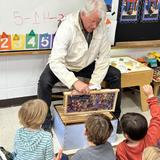 Baker Demonstration School Photo #30 - Bringing the community into the Baker Classroom is a staple of education, discovery and real-world connections. Our Kindergarten class was studying bees and the environment; a local beekeeper joined the class for a lively discussion.