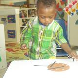 Country Club Hills KinderCare Photo #3 - Collage time in the toddler room.