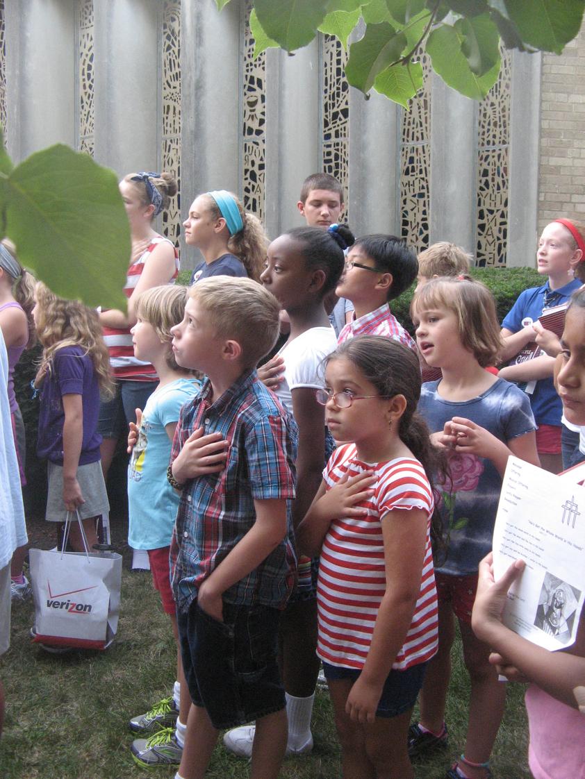 St. Johns Lutheran School Photo - On Patriot Day, 9-11, St. John's students commemorated those who lost their lives with a veteran playing "Taps" at our flagpole.