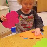West Carol Stream KinderCare Photo #2 - Aivan utlized his math skills to sort and name shapes and colors.
