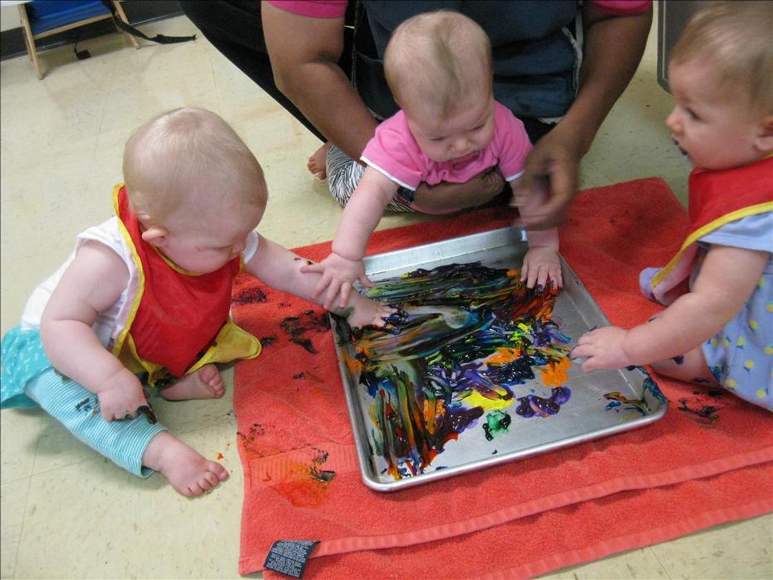 Lombard KinderCare Photo - Even at a young age, children engage in process art